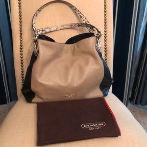 Coach like new leather tan-black  snake straps.